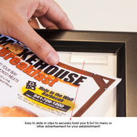 Insert your (4) 8.5 x 11 menus into clear clips positioned on the backside of the snap frame, underneath the protective overlay.